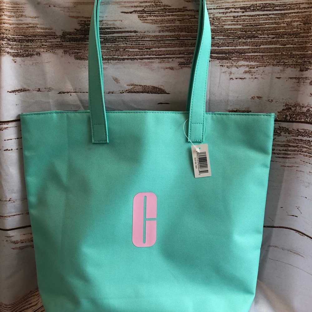 Clinique tote bag and matching makeup bags